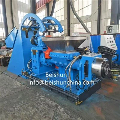 Kummi ekstrusioonimasin